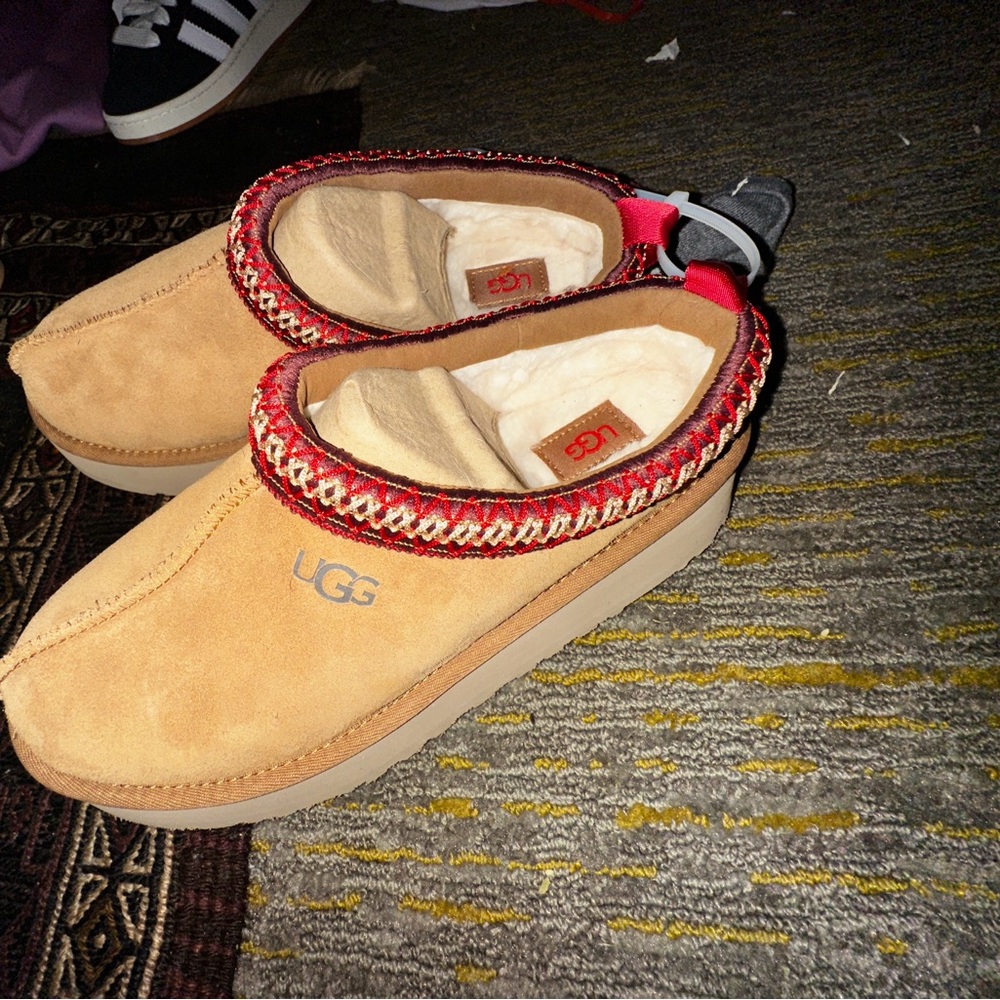 UGG Tan Suede Slippers with Red Accents